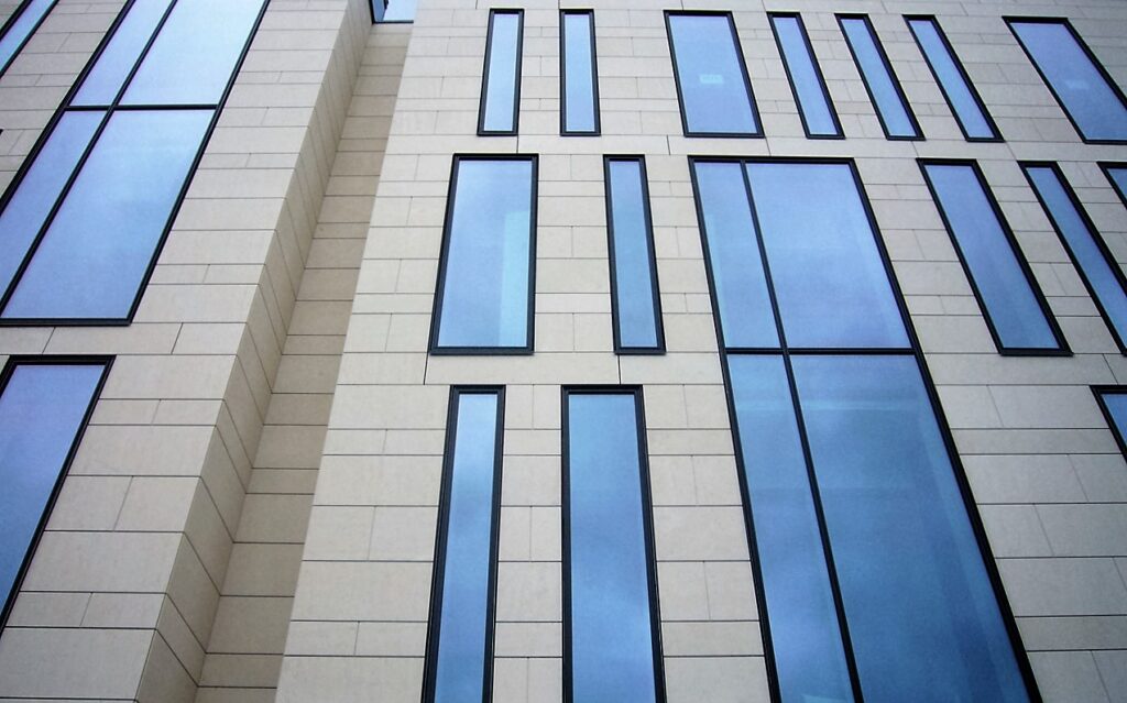 Exterior view of Gyldengården clad in Bulgarian natural stone