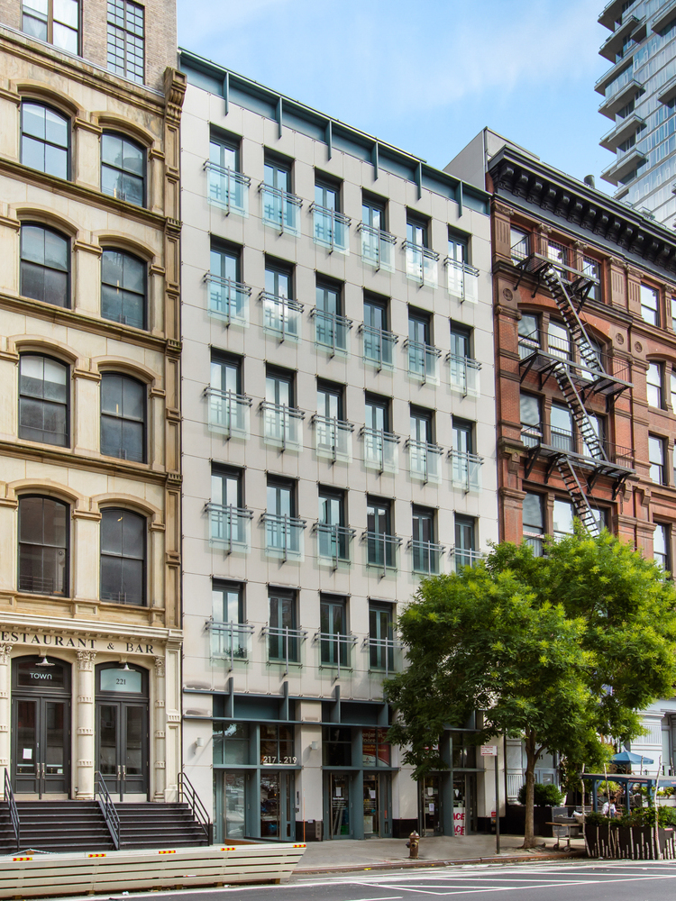 Modern New York architecture grounded by a solid Vratza stone grid